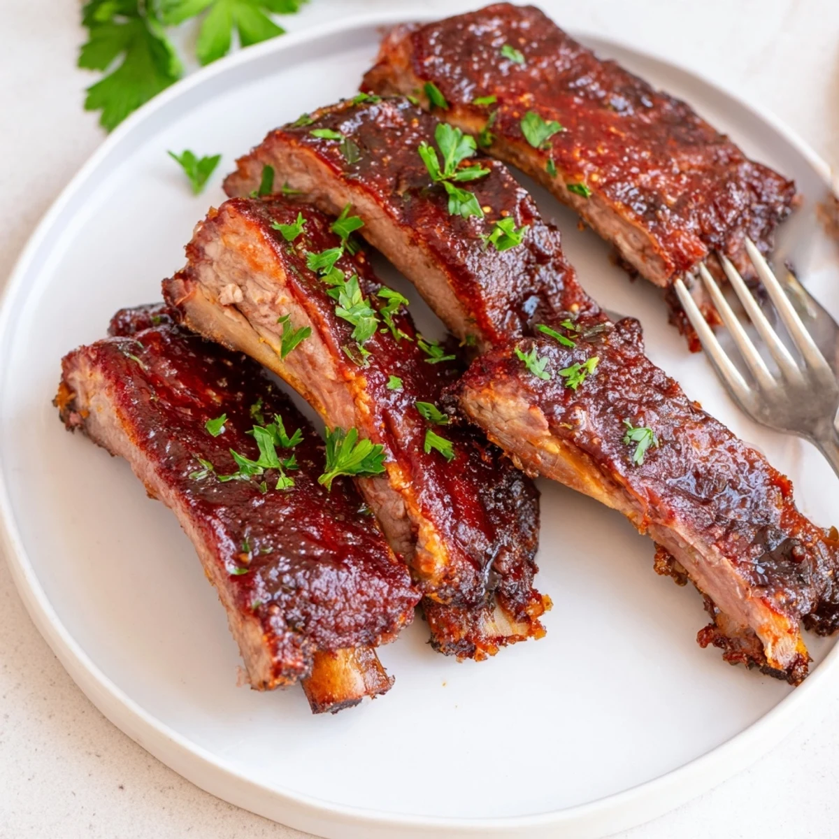 Tender classic BBQ ribs with dry rub, perfectly charred and ready to savor.  