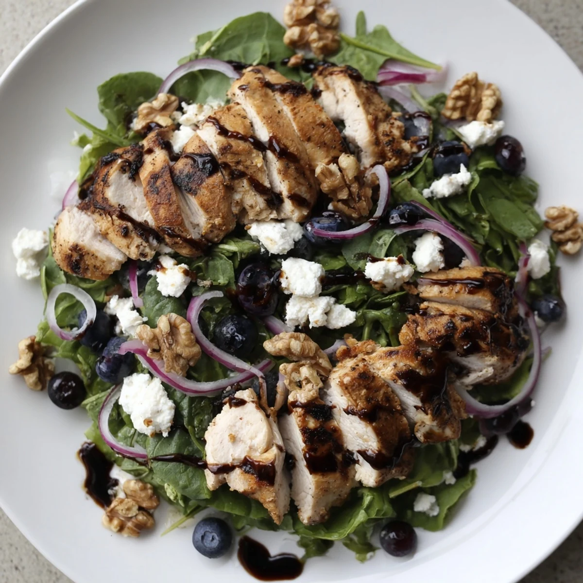 Vibrant blueberry goat cheese chicken salad, with juicy blueberries and creamy goat cheese.