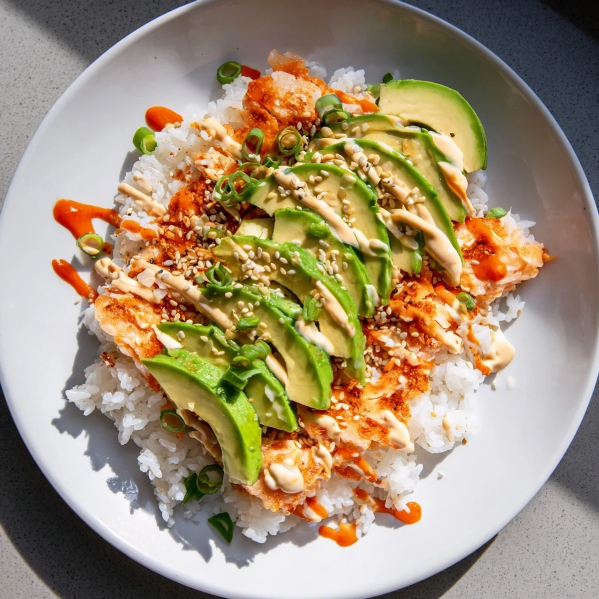 Flaky salmon atop seasoned rice makes Classic Salmon Rice, a quick and easy Asian-inspired dinner.