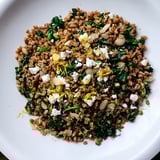 A visual of Warm Farro & Greens Pilaf, featuring fluffy farro with spinach and crunchy toasted almonds.