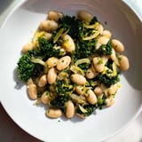 Close-up of vibrant Garlicky Beans with Winter Greens, showcasing tender greens and creamy beans, seasoned perfectly.