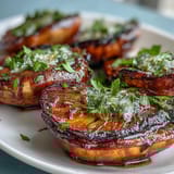 Lemon butter scallops seared to golden perfection in a rich, citrusy sauce with fresh parsley.  