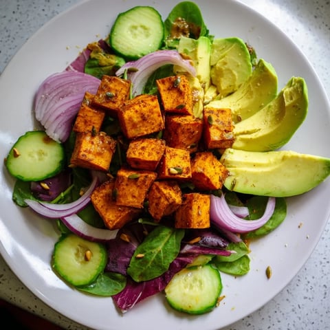Vibrant Spiced Peanut Sweet Potato & Radicchio Salad Bowl, featuring roasted sweet potatoes and a creamy peanut dressing.
