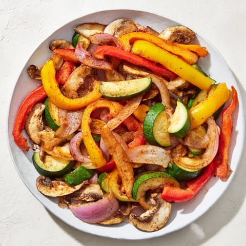 A colorful medley of seasoned veggies, cooked to perfection for these delicious veggie skillet fajitas.