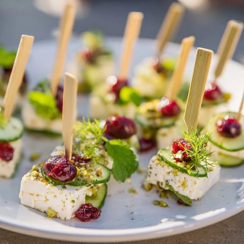 These gluten-free Holiday Cranberry-Feta Skewers show the sweet cranberries paired with salty feta cubes.