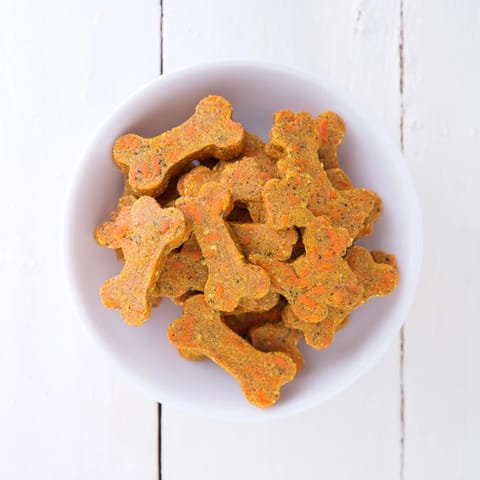 Golden-brown Friendly Dog Paw Treats, a healthy and delicious homemade snack for your pup.