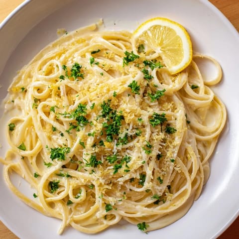 A bowl of delicious Lemon-Garlic Greek Yogurt Pasta, a quick and easy vegetarian dinner idea.