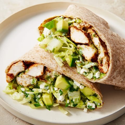 Delicious Green Goddess Chicken Wraps ready to eat, with a close-up of the flavorful, colorful filling.