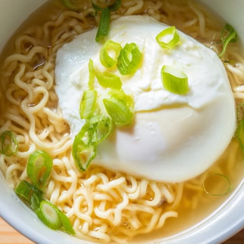 Creamy butter melts into flavorful broth, highlighting this upgraded instant ramen with egg’s beautiful simplicity.