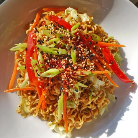 Close-up of Spicy Ramen Stir Fry, a quick and delicious weeknight dinner with fragrant aromas.