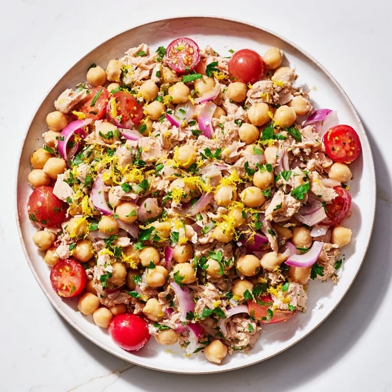 Enjoy a delicious bowl of homemade Dense Chickpea and Tuna Salad, a quick and easy recipe.