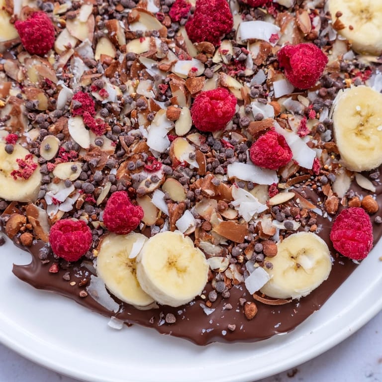 Homemade Chocolate Banana Bark ready to break into delicious, sweet, and frozen pieces.