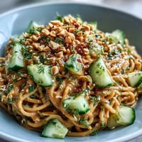 Cold Peanut Sesame Noodles with cucumber, a cool, creamy Asian-inspired delight.